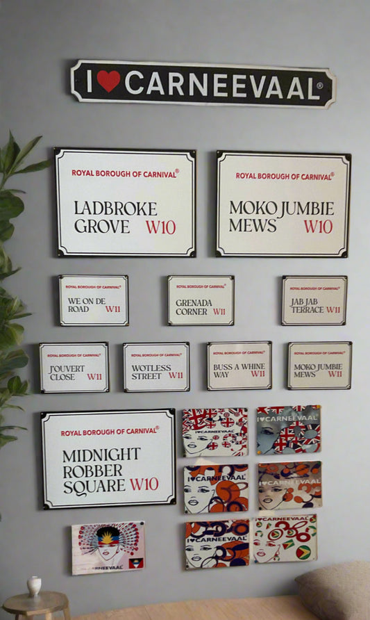 Gallery wall with a mixture of large and mini metal indoor carnival street signs