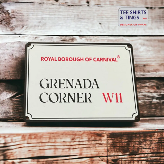 Grenada Corner W11 Royal Borough of Carnival decorative street sign displayed against rustic weathered wood planks