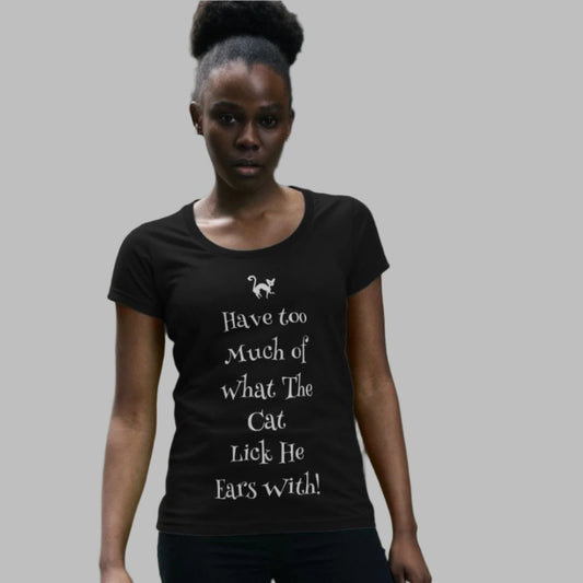 Model wearing black t-shirt with white  lettering saying Have Too Much Of What Th Cat Lick His Ears With