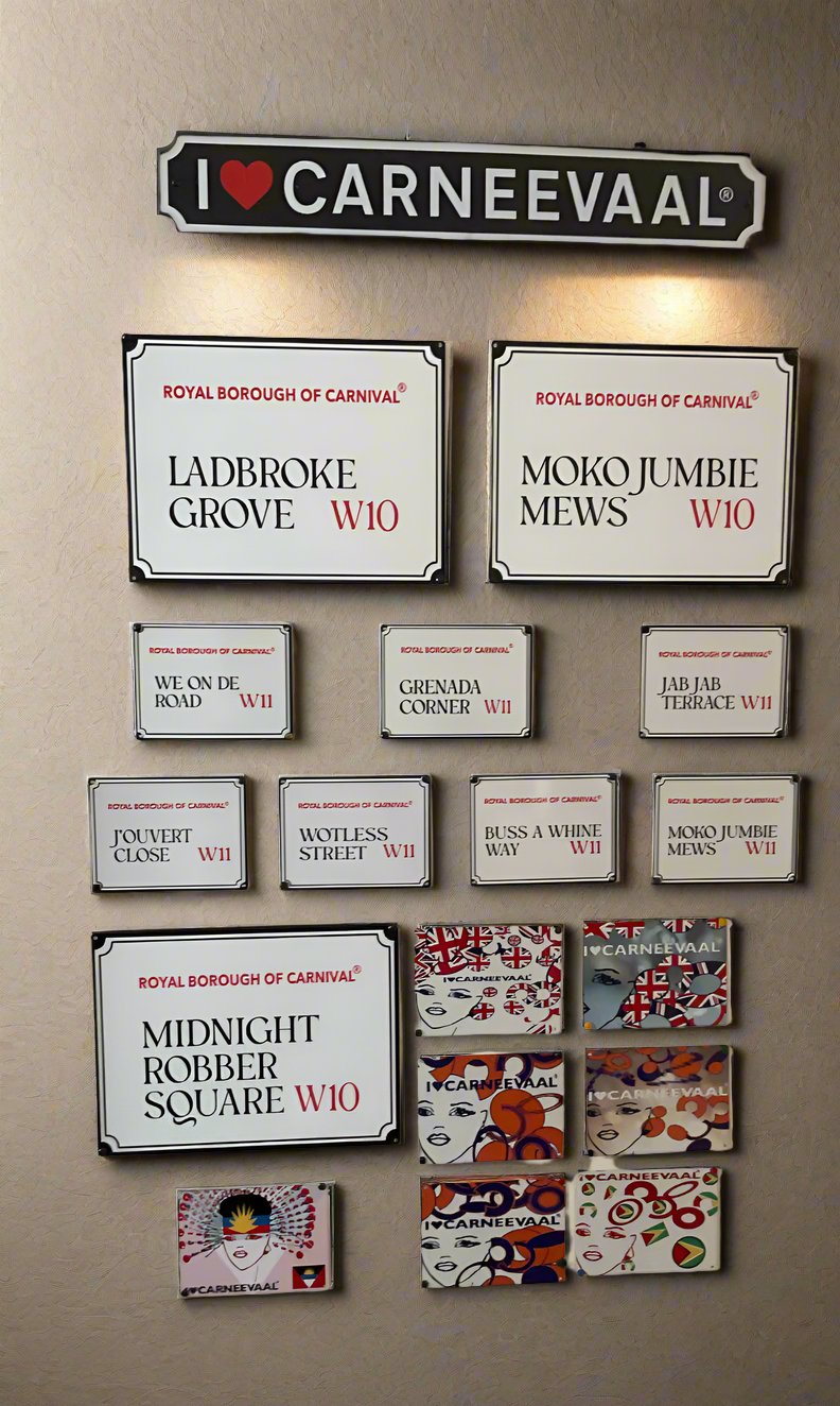 Gallery Wall with a mixture of large and mini street signs with overhead lighting.