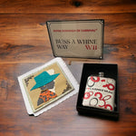 I. Love Carneevaal Hip flask displayed with greeting card and a Buss A Whine Way mini metal sign