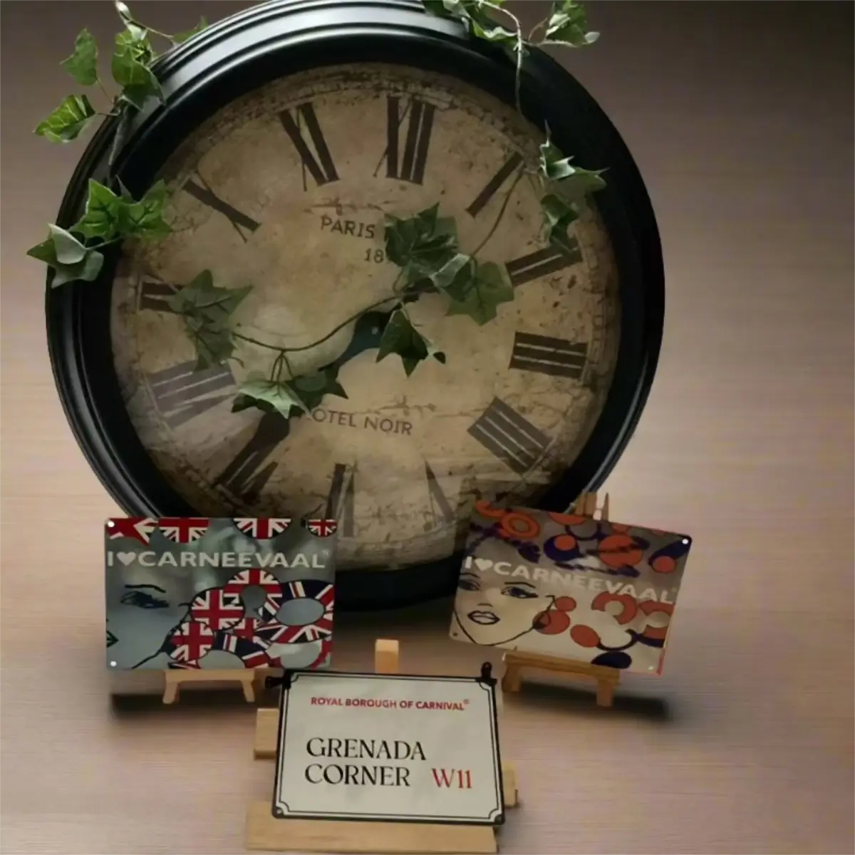 Grenada Corner W11 decorative street sign and carnival art signs styled on mini easels beside a vintage wall clock