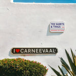 ILC metal sign on a white wall with logo