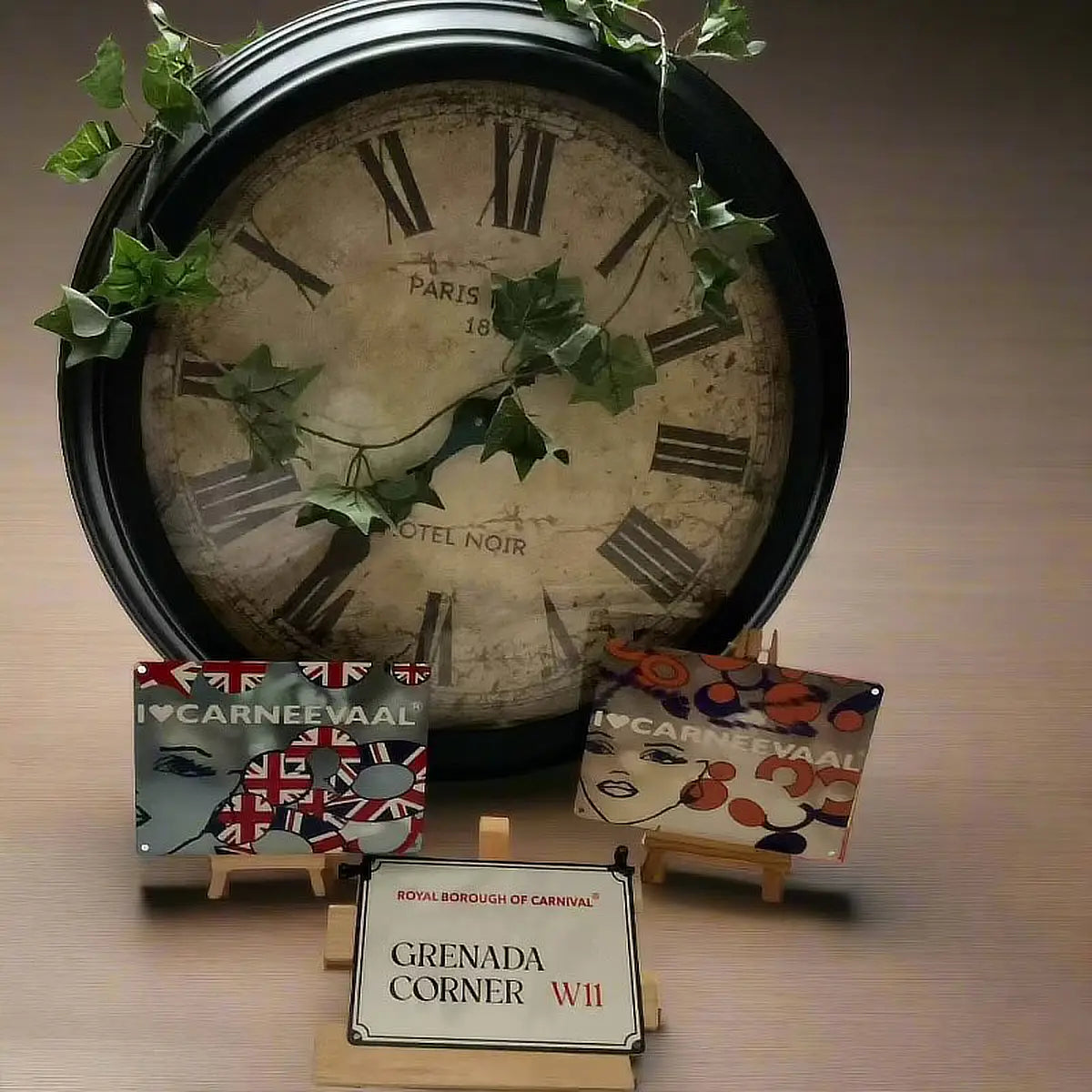 Medly_of_mini_decorative_signs_around_clock_face⁠