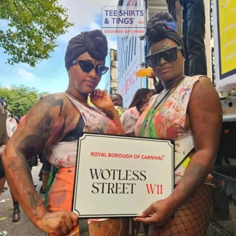 NHC - Wotless UK  holding large Wotless Street Sign.webp
