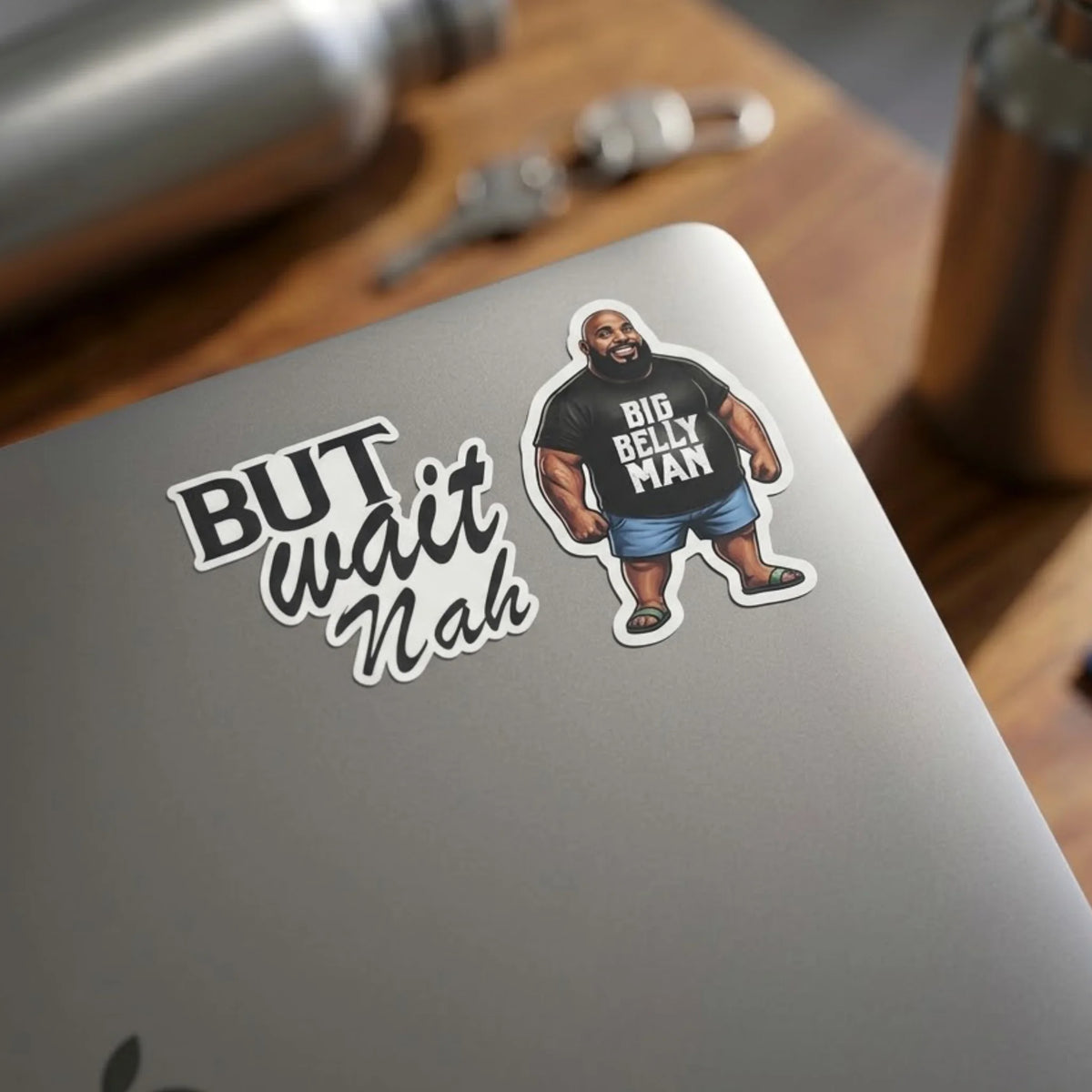 The Big, But & Jerk Sticker Set displayed on a laptop alongside styled studio props.