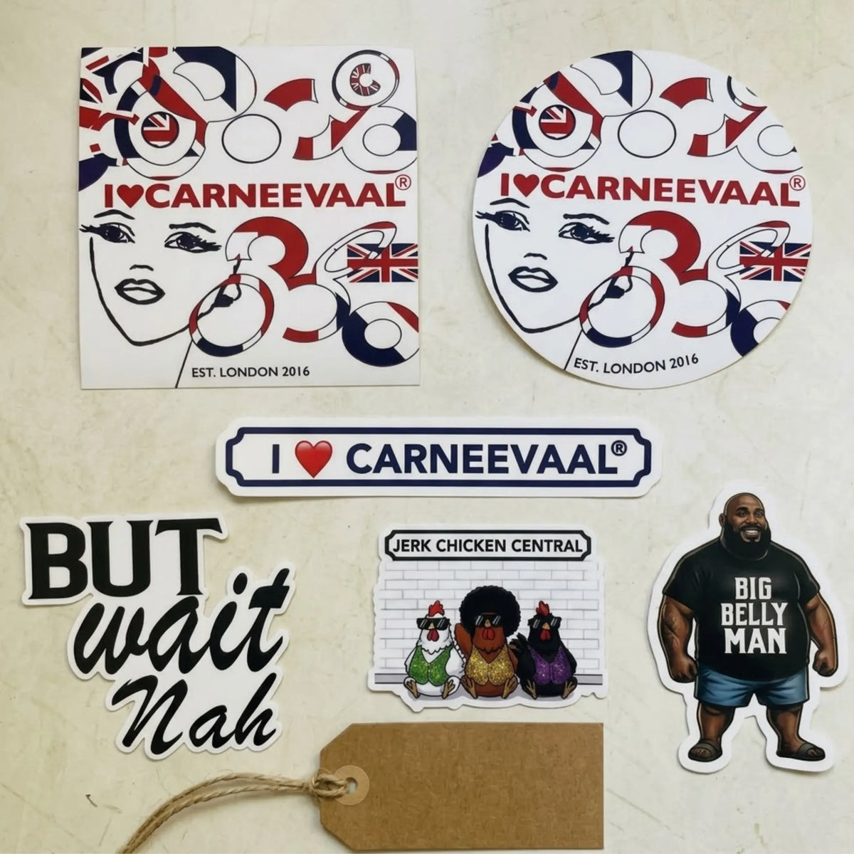 Complete vinyl sticker suite from The Collector’s Edition featuring I Love Carneevaal emblems, But Wait Nah, Jerk Chicken Central, and Big Belly Man on a warm studio background.