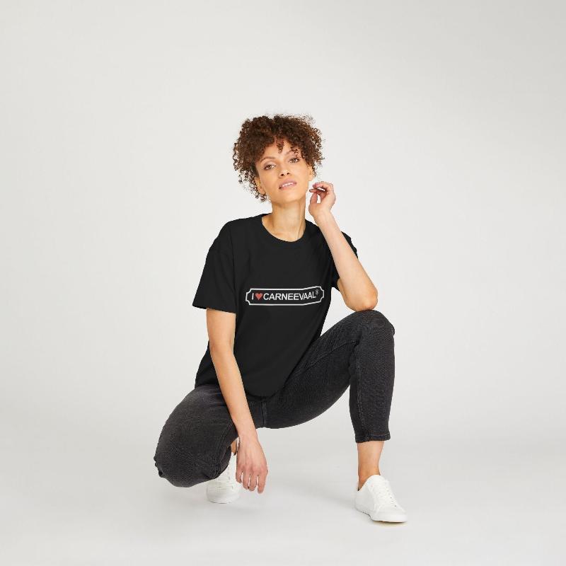 Girl wearing cropped tpp kneeling on one knee