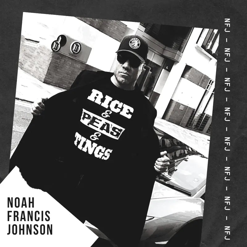 Noah Francis Johnson wearing a Rice & Peas T-shirt in a black and white portrait celebrating Caribbean culture by Tee Shirts and Tings