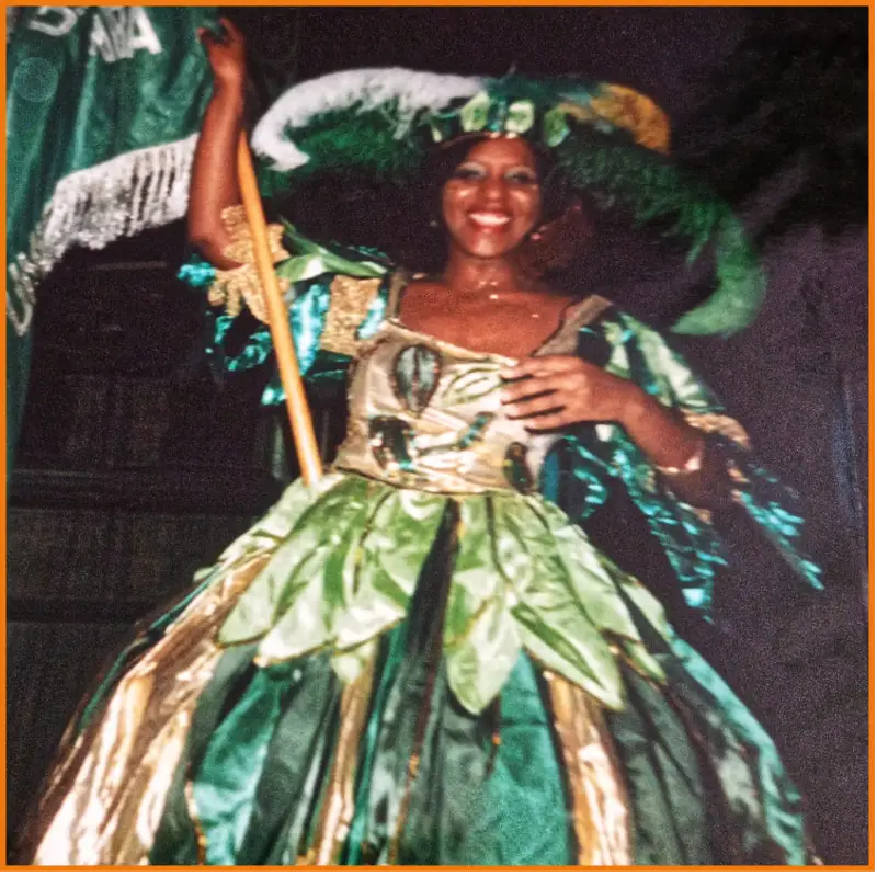 Founder wearing an authentic green and gold Porta-Bandeira carnival costume celebrating cultural heritage for Tee Shirts and Tings