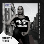 Black and white photo of Empress Storm wearing a black scoop-necked organic teeshirt with white wording reading Pick Sense Out of Nonsense.