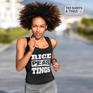 Young lady wearing a 100% organic black cotton tank with bold white print saying Rice, Peas, Tings